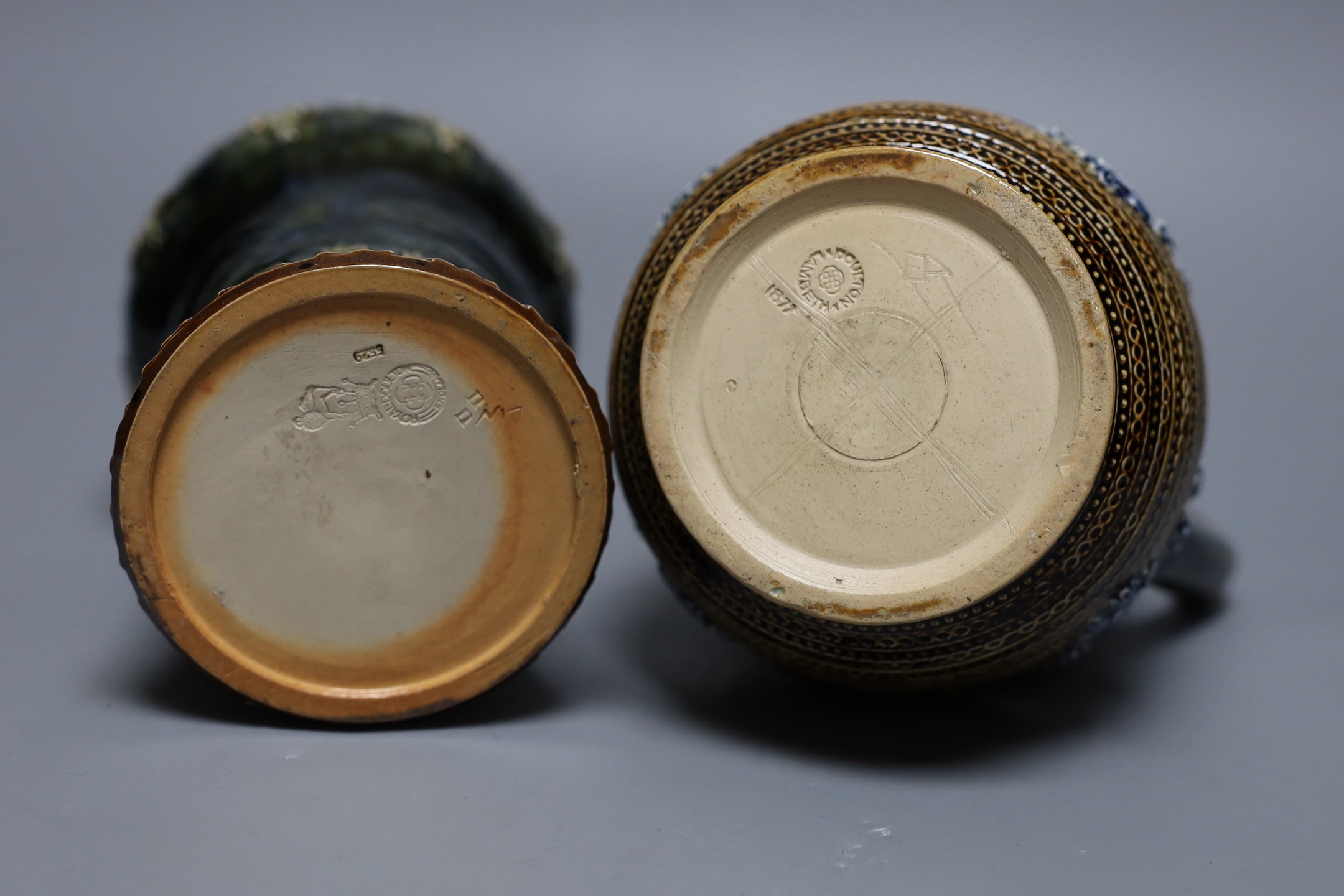 A Doulton Lambeth stoneware decanter and a similar jug, dated 1877, jug 24cms high